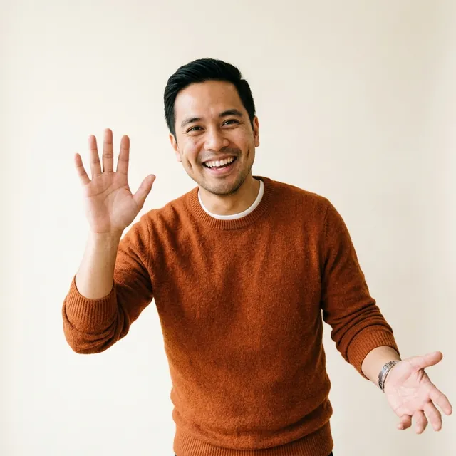 Student waving hello, welcoming new members to group French classes