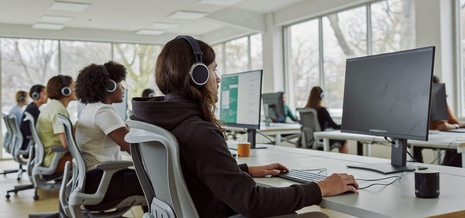 Candidates taking the TEF Canada French exam on computers at an official test centre