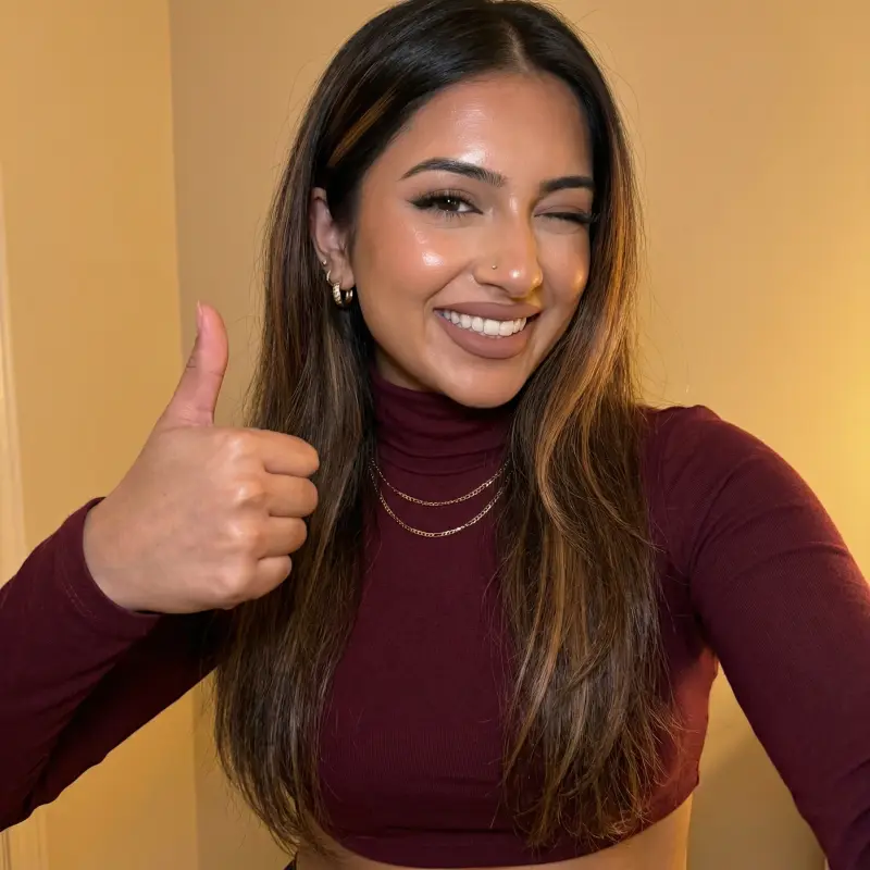 Happy French student giving a thumbs up